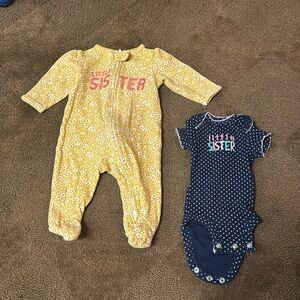 0-3 sleeper, rarely used. Blue premie, never used. Both are Carters